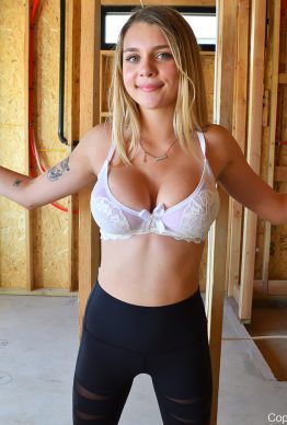 Hot young blonde chick Gabbie flaunts her huge boobs while changing lingerie