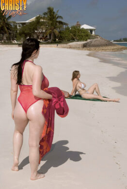 Buxom natural busty babes meet to have steaming lesbian sex on the beach